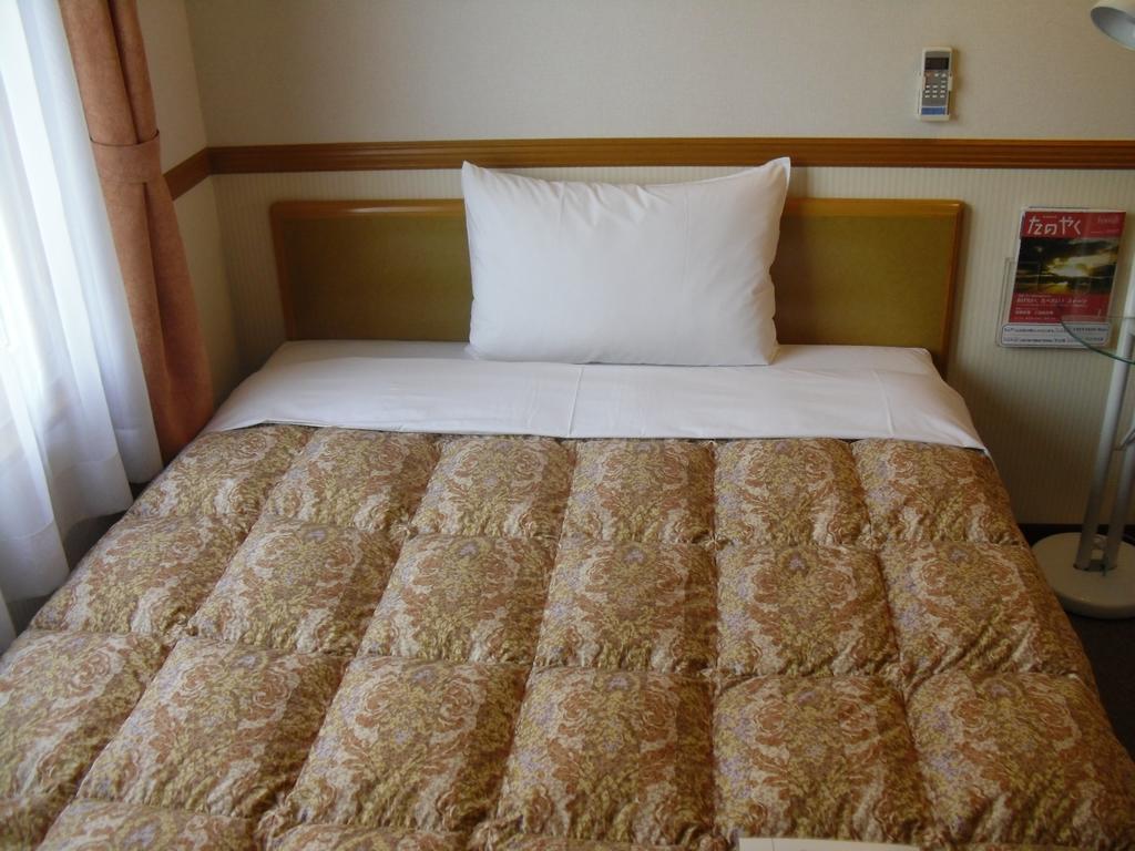 Toyoko Inn Tokyo Shinagawa-eki Takanawa-guchi Exterior foto